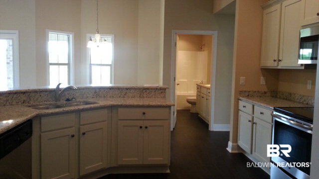 18958 Isleworth Way Foley, AL 36535 - Photo 9 of 20 Spacious Kitchen w/Granite Countertops