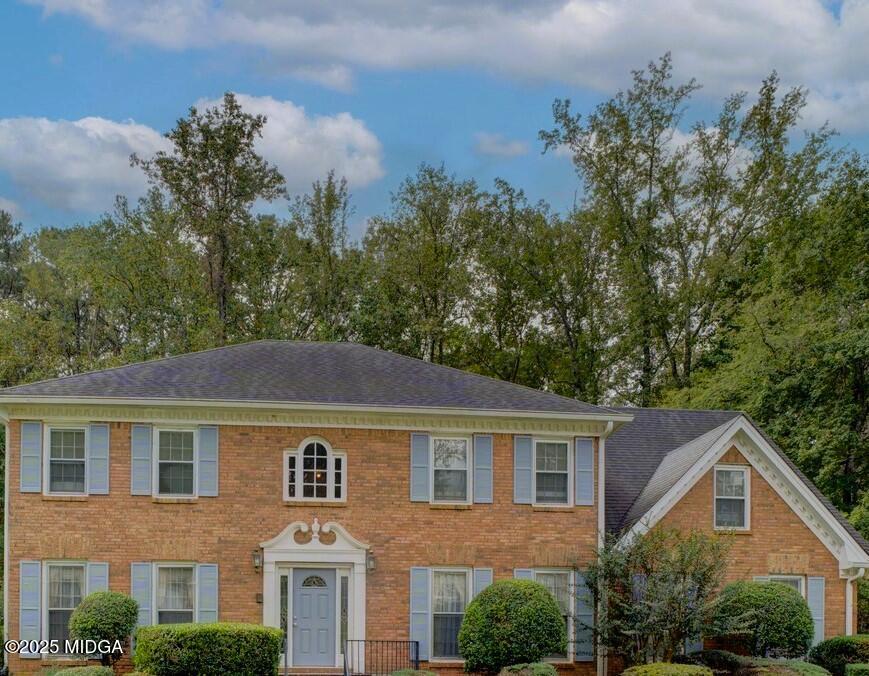 5633 Fox Den Trail Lithonia, GA 30038 - Photo 5 of 44 a front view of a house with a yard