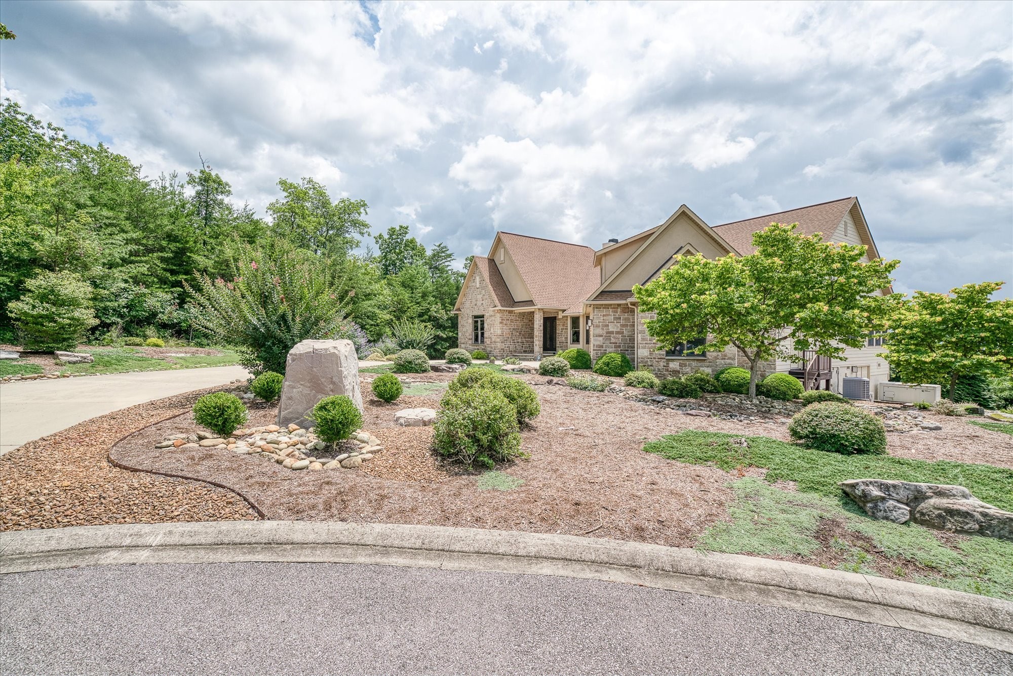 61 Bluff View Terrace Crossville, TN 38558 - Photo 20 of 81 a front view of a house with a yard and trees