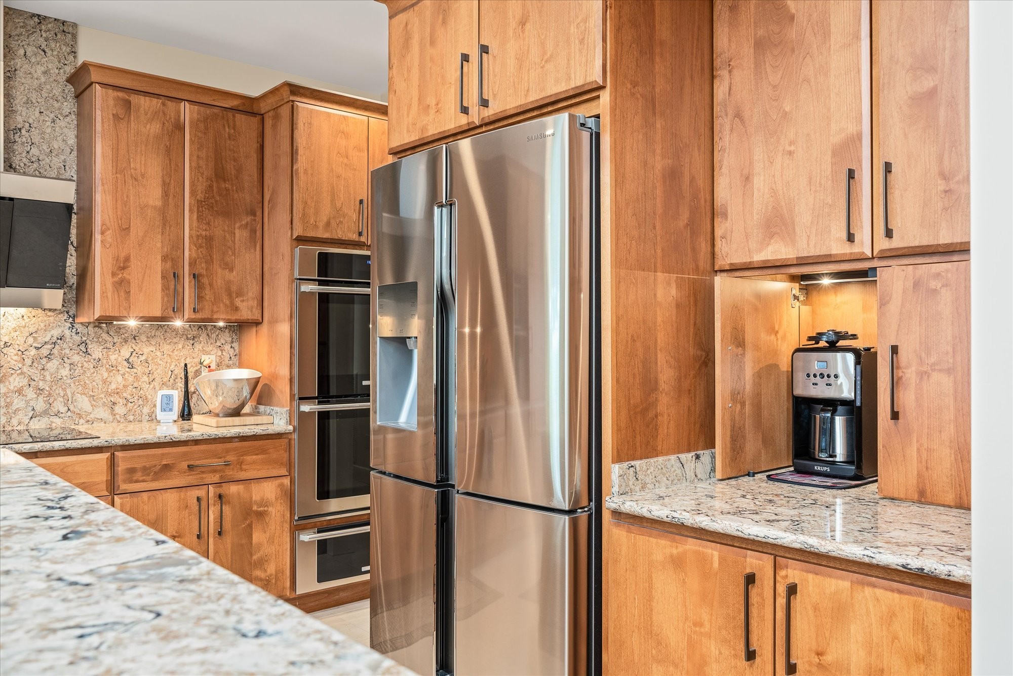 61 Bluff View Terrace Crossville, TN 38558 - Photo 42 of 81 a kitchen with stainless steel appliances granite countertop a refrigerator a sink and a stove