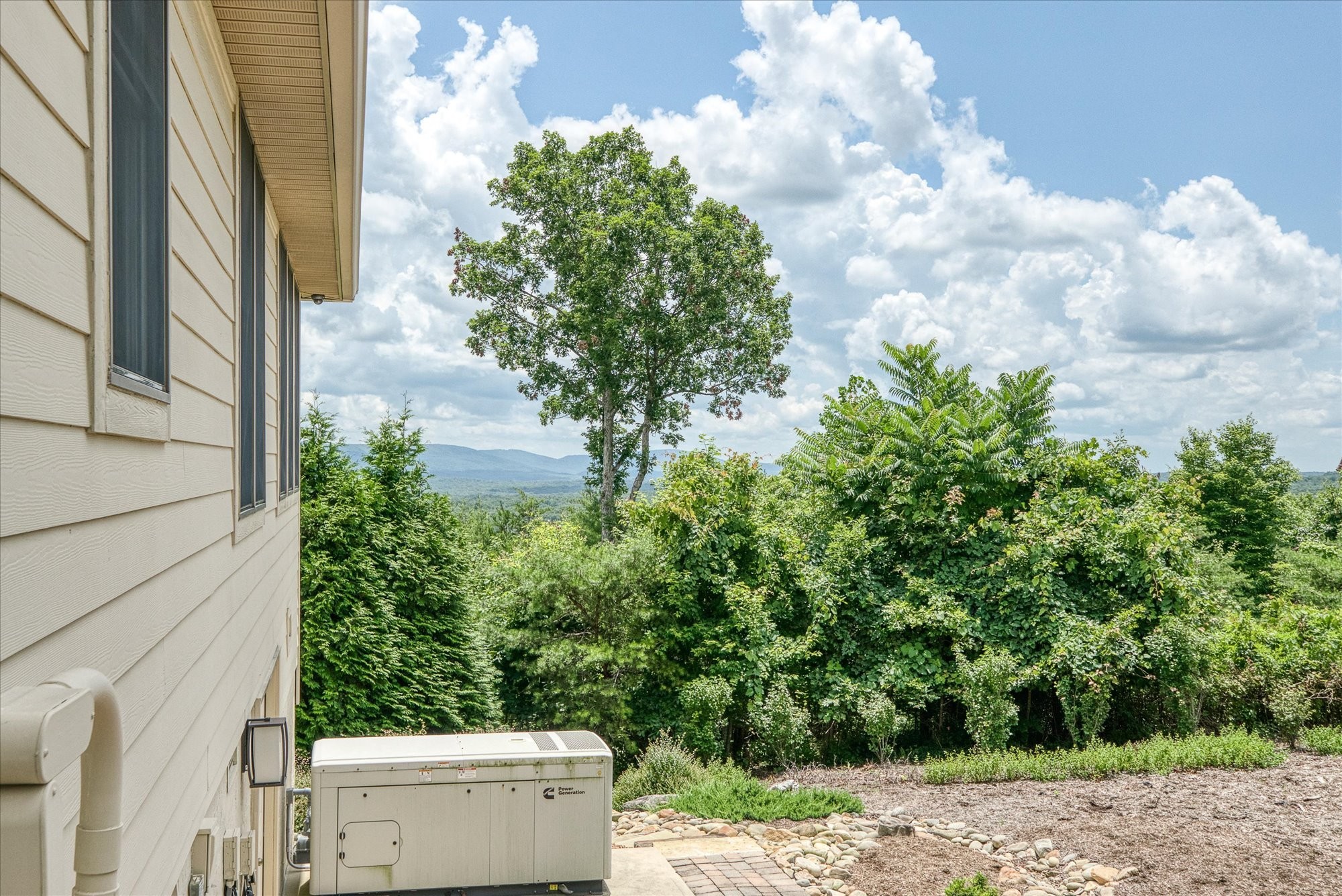 61 Bluff View Terrace Crossville, TN 38558 - Photo 5 of 81 a view of a yard with plants and a fountain