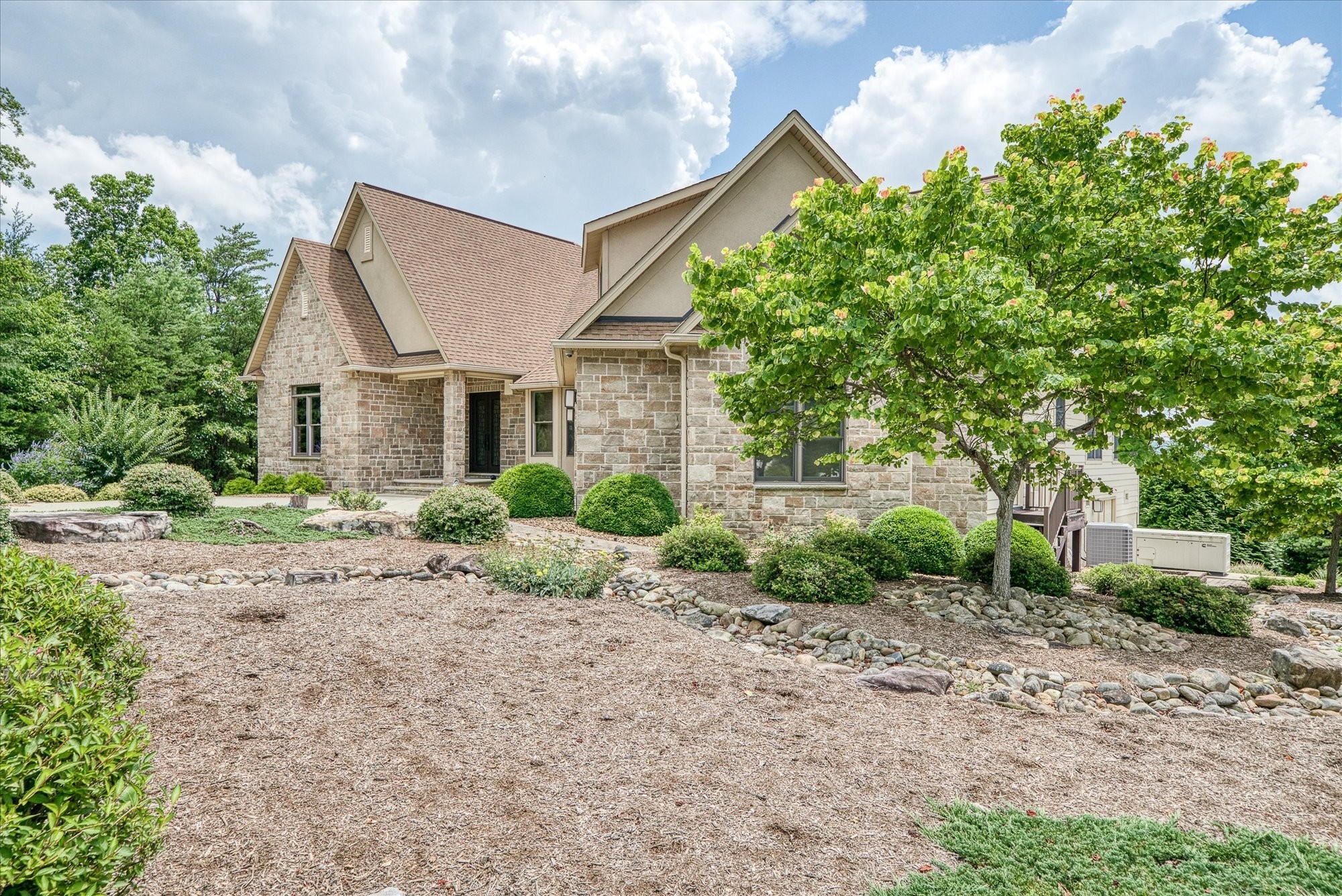 61 Bluff View Terrace Crossville, TN 38558 - Photo 6 of 81 a front view of a house with a yard and a garage