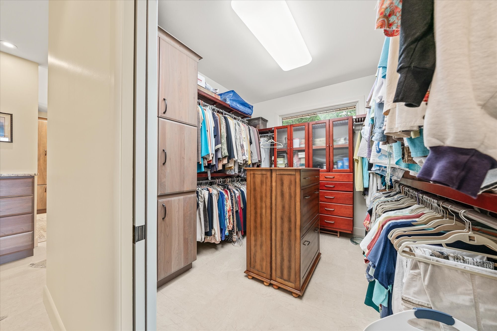61 Bluff View Terrace Crossville, TN 38558 - Photo 65 of 81 a view of walk in closet with clothes and shoes