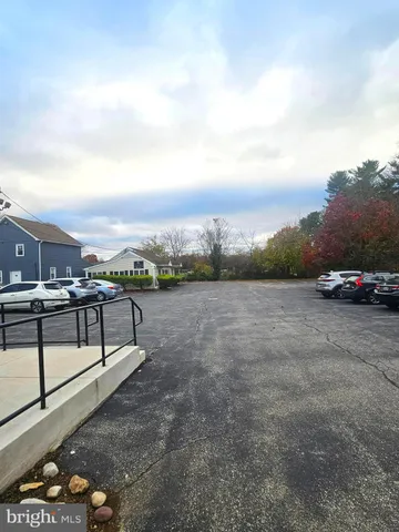 a view of a terrace with yard