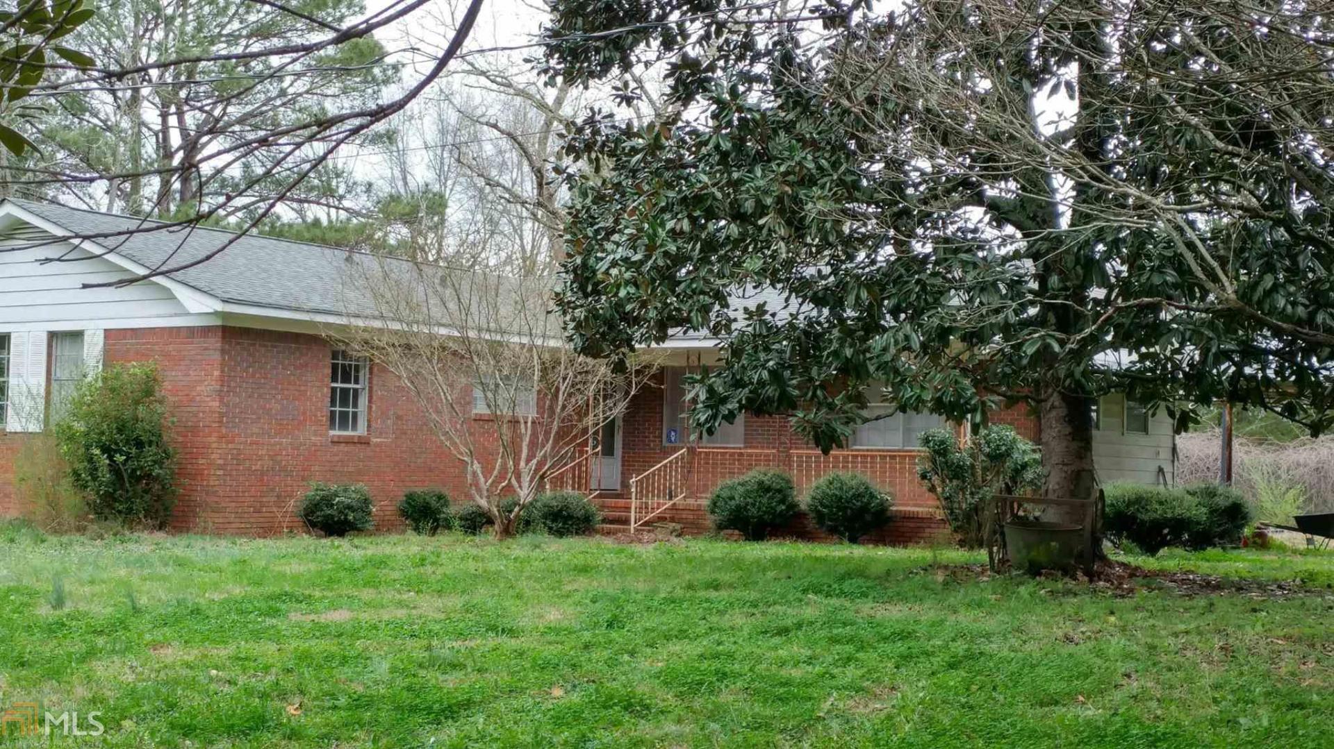 10205 Luthersville Road Gay, GA 30218 - Photo 1 of 1 a view of a back yard