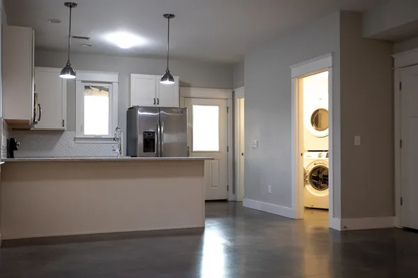 a view of a kitchen and window