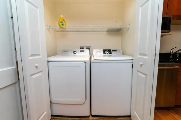 a utility room with dryer and washer