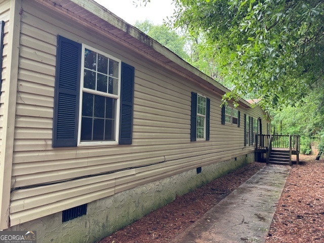 196 Old Scout Road Jackson, GA 30233 - Photo 1 of 1 a view of a house with a yard