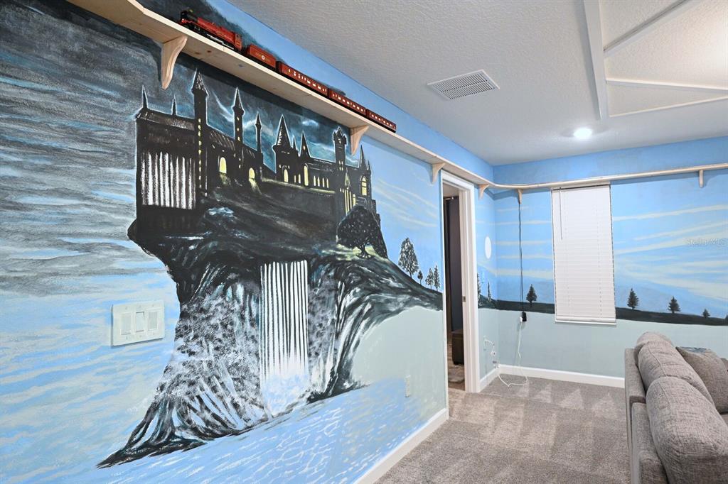 2956 Penelope Loop Kissimmee, FL 34746 - Photo 46 of 94 a view of a porch with a table and chairs