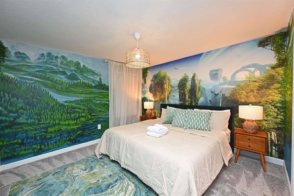 2956 Penelope Loop Kissimmee, FL 34746 - Photo 76 of 94 a bedroom with a bed painting on wall and a large window