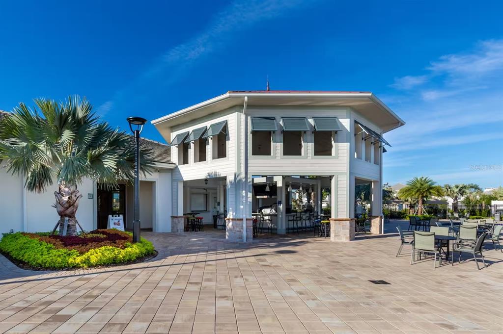 2956 Penelope Loop Kissimmee, FL 34746 - Photo 91 of 94 a view of a house with a patio
