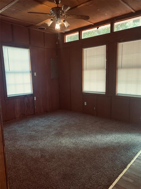 7046 Camp Street Azle, TX 76020 - Photo 11 of 26 a view of an empty room with a window