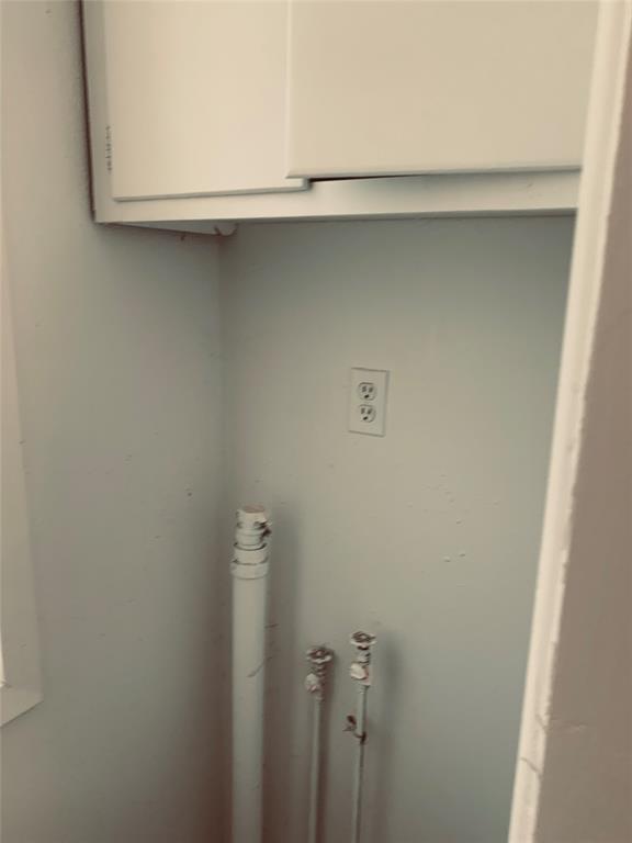 7046 Camp Street Azle, TX 76020 - Photo 16 of 26 a close view of a closet in the kitchen