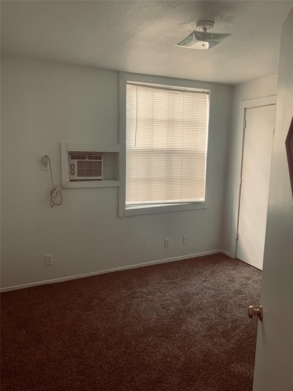 7046 Camp Street Azle, TX 76020 - Photo 19 of 26 an empty room with a window