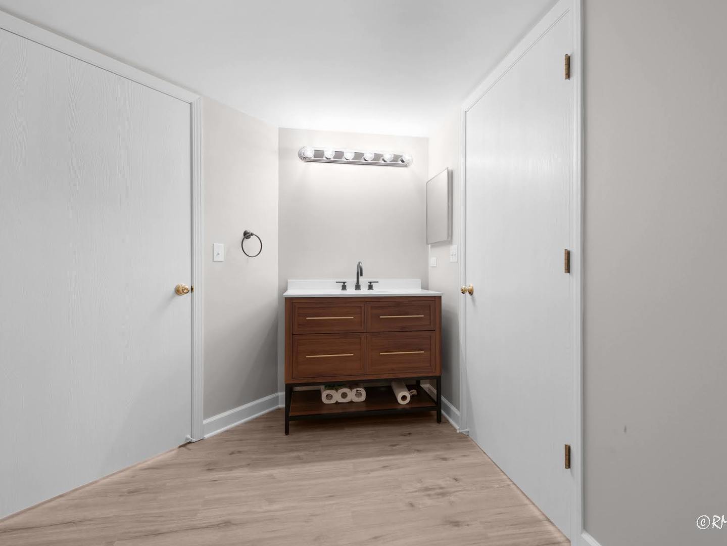 237 North Mill Road, Unit 12 Addison, IL 60101 - Photo 12 of 21 a room with a bench and a mirror