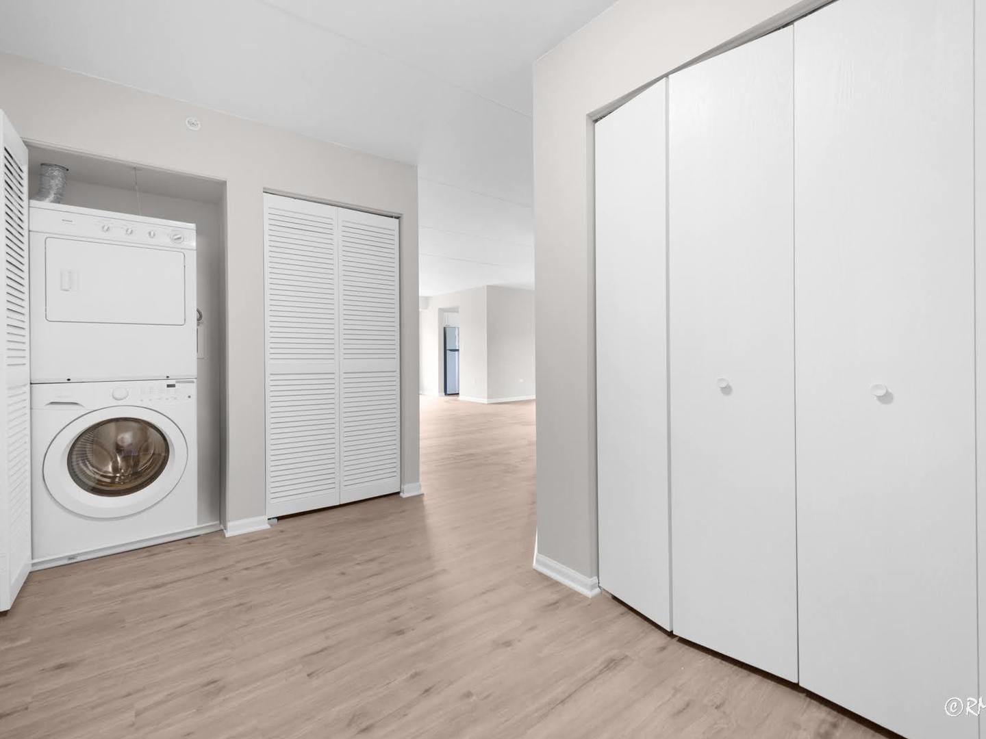 237 North Mill Road, Unit 12 Addison, IL 60101 - Photo 16 of 21 a view of a storage & utility room with washer and dryer