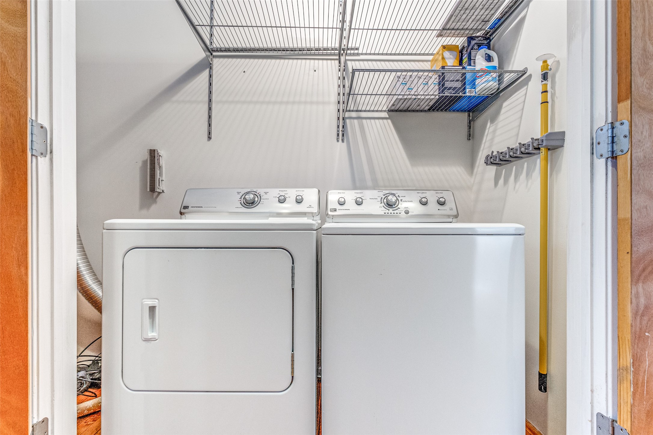 1312 Live Oak Street, Unit 223 Houston, TX 77003 - Photo 22 of 31 Laundry or utility area with built-in storage and practical layout.