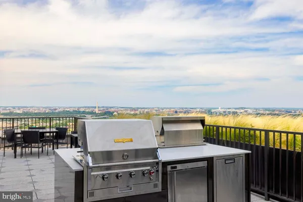 a view of a balcony with city view