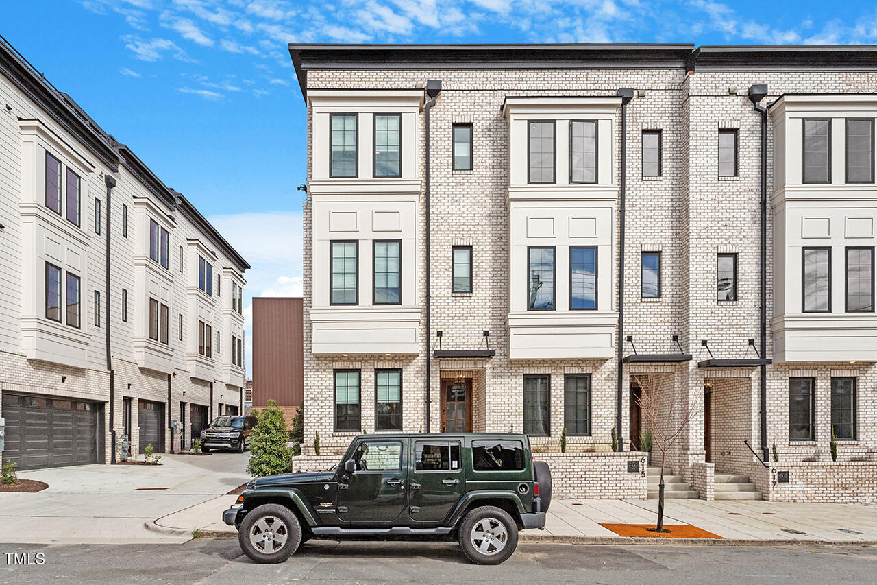 613 South West Street Raleigh, NC 27601 - Photo 2 of 37 a car parked in front of a building
