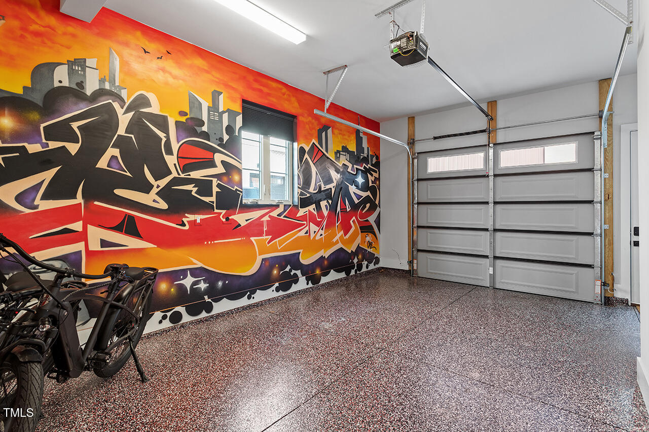 613 South West Street Raleigh, NC 27601 - Photo 7 of 36 an empty room with storage