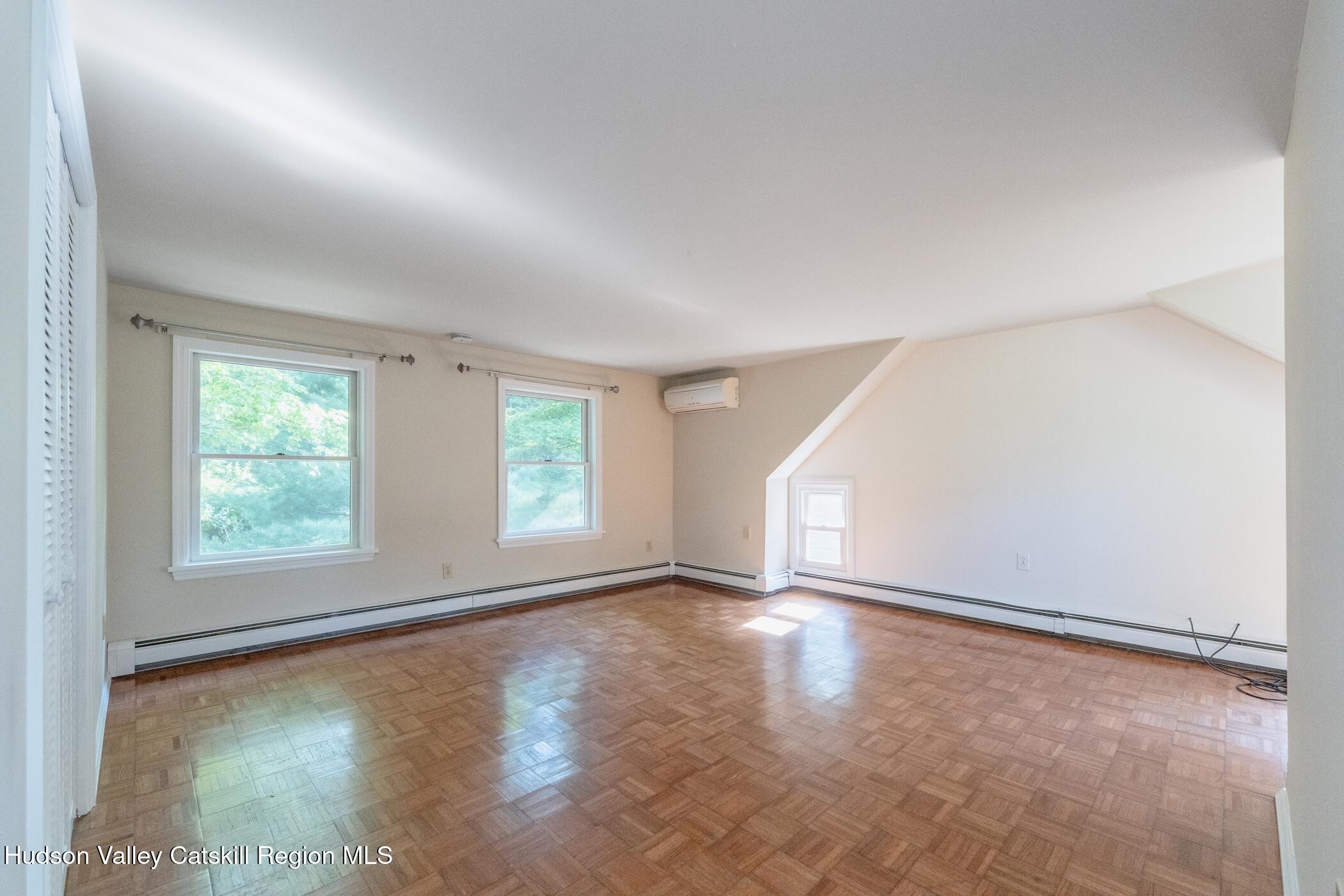 4533 Atwood Road Stone Ridge, NY 12484 - Photo 32 of 63 an empty room with windows