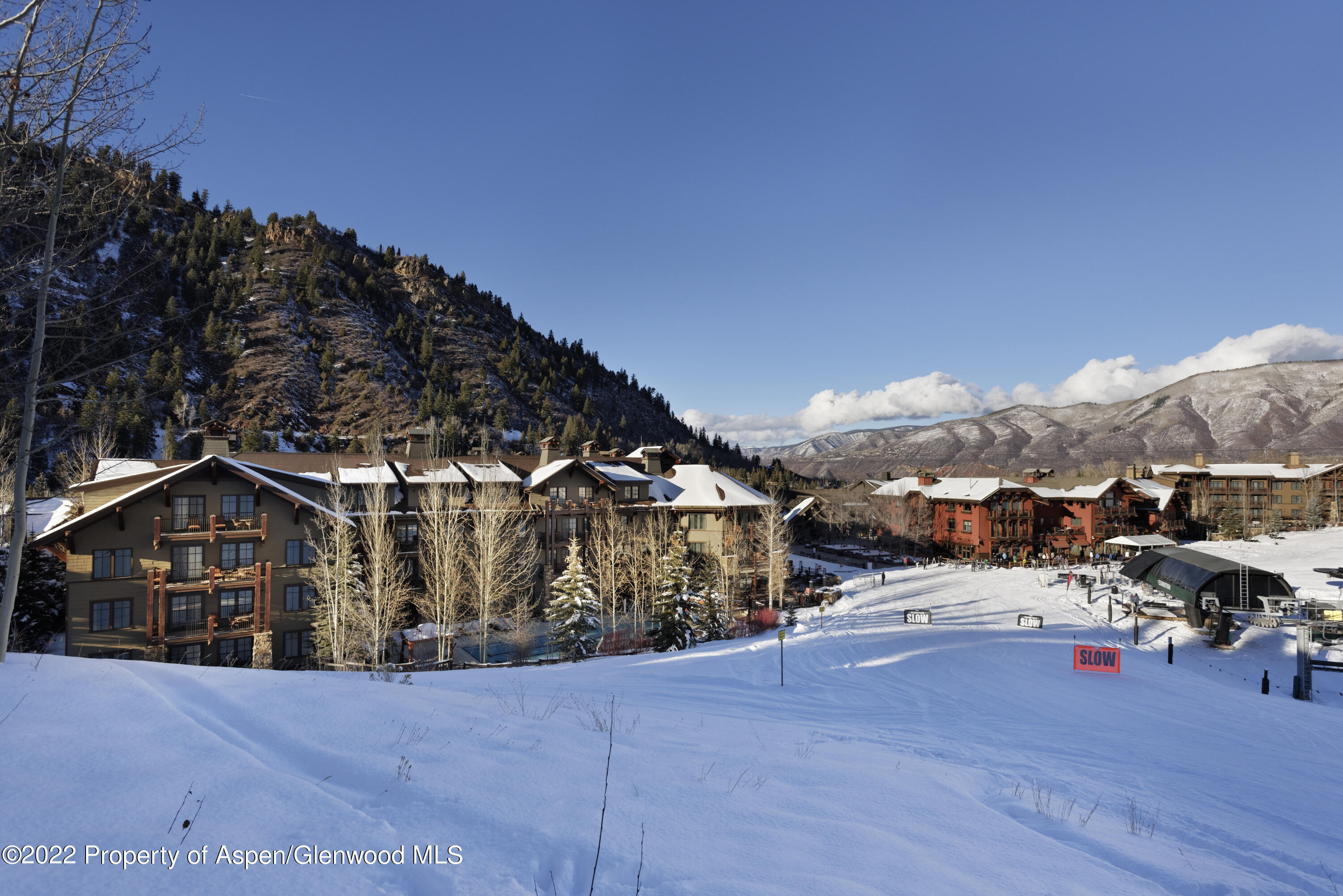 39 Boomerang Road, Unit 8209 SUMMER INTEREST 9 Aspen, CO 81611 - Photo 11 of 26 a view of a house next to a road