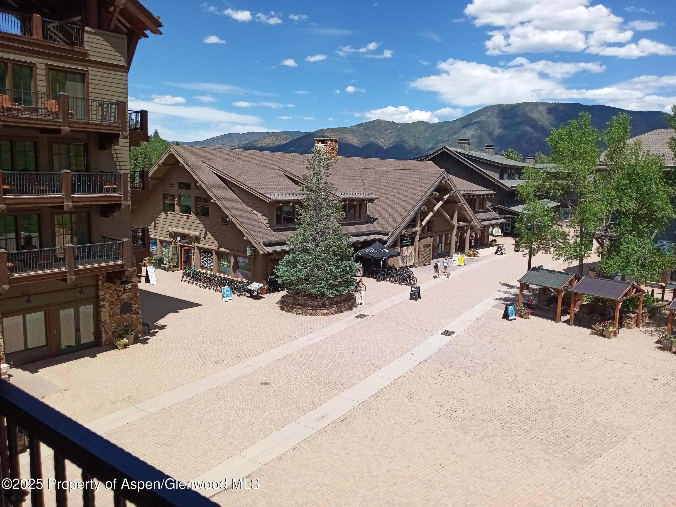 39 Boomerang Road, Unit 8209 SUMMER INTEREST 9 Aspen, CO 81611 - Photo 16 of 26 a view of a terrace with chairs