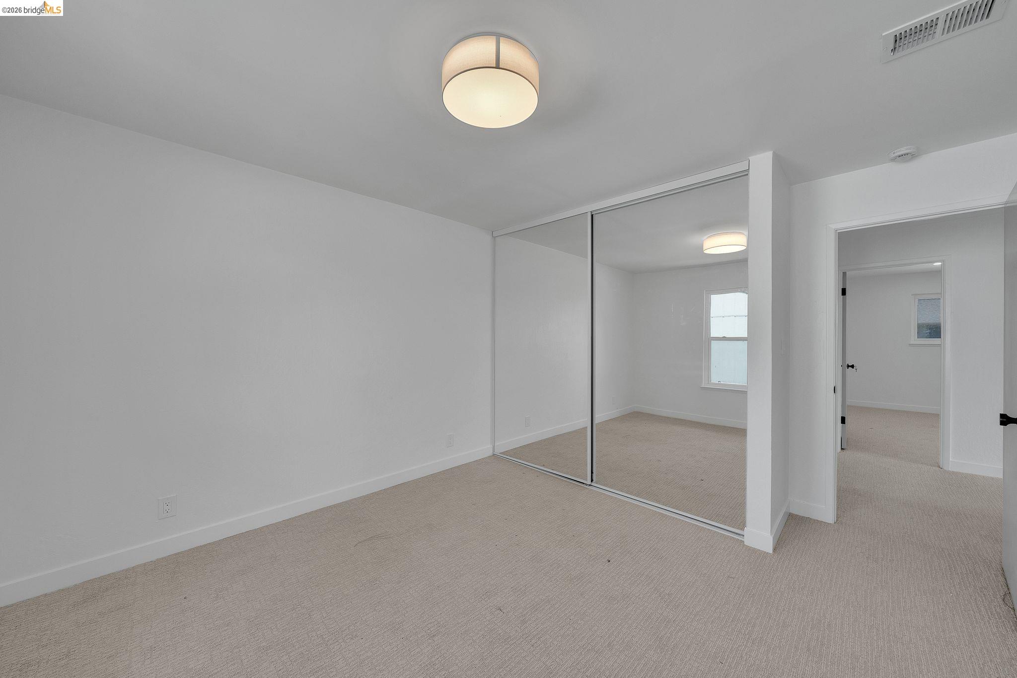1808 Wildbrook Court, Unit D Concord, CA 94521 - Photo 28 of 47 wooden floor in an empty room