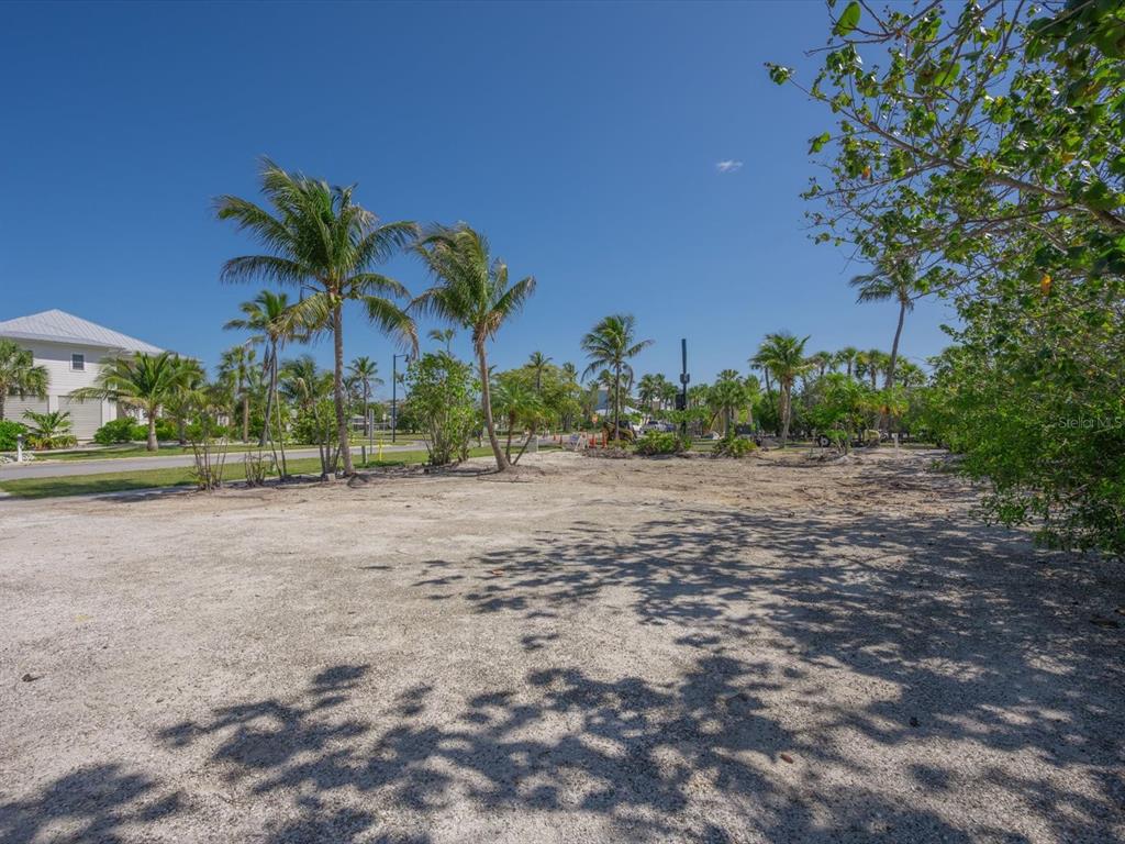 720 Broadway Street Longboat Key, FL 34228 - Photo 2 of 41 a view of a yard with a fountain