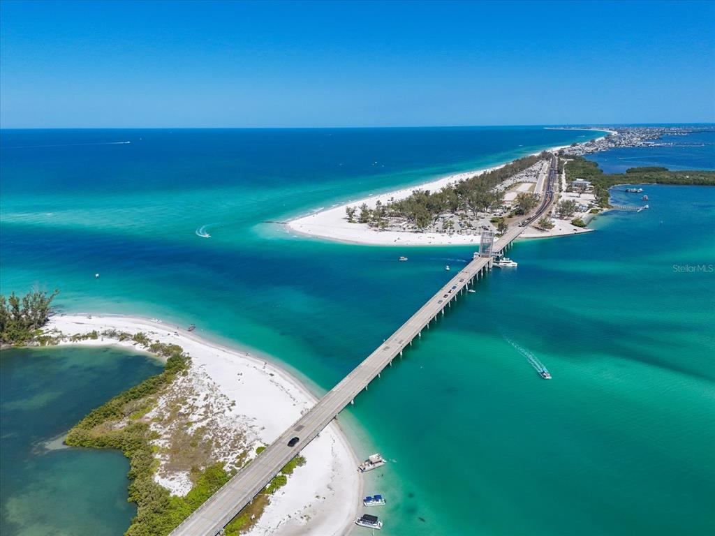 720 Broadway Street Longboat Key, FL 34228 - Photo 27 of 41 a view of a lake with a yard