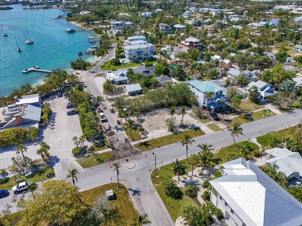 720 Broadway Street Longboat Key, FL 34228 - Photo 37 of 41 an aerial view of residential houses with outdoor space