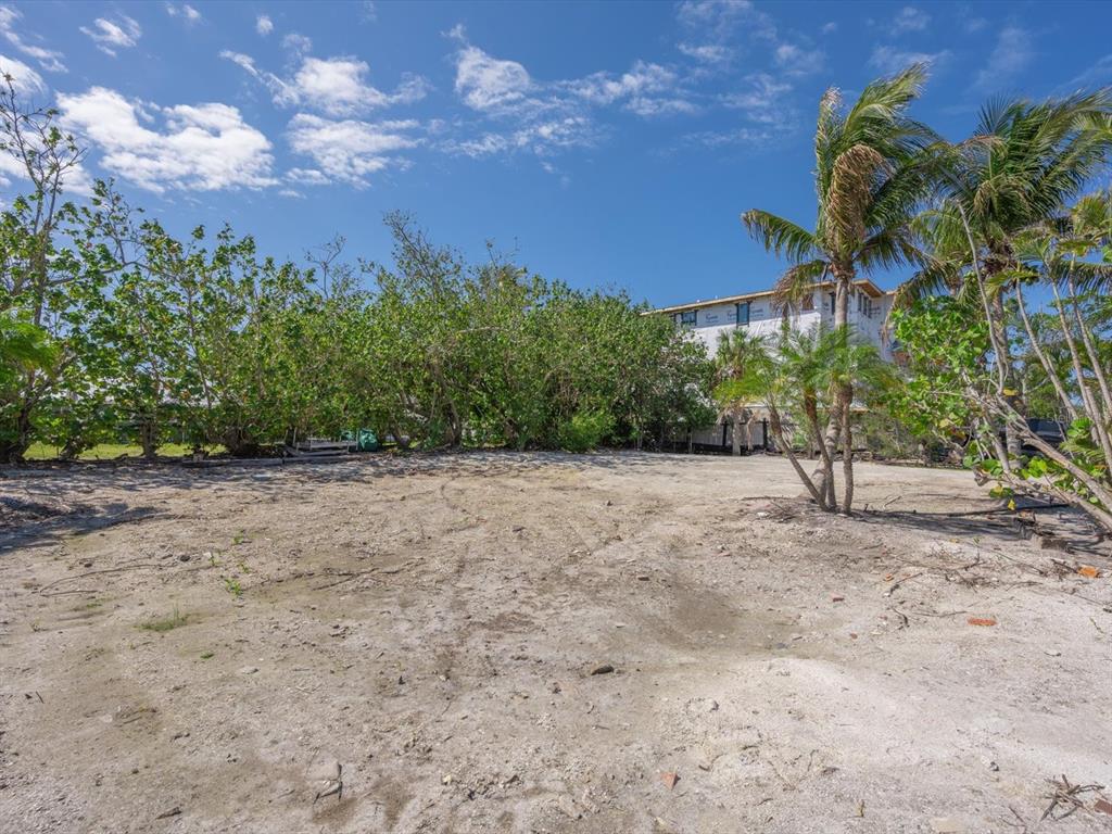 720 Broadway Street Longboat Key, FL 34228 - Photo 4 of 41 a view of outdoor space and yard