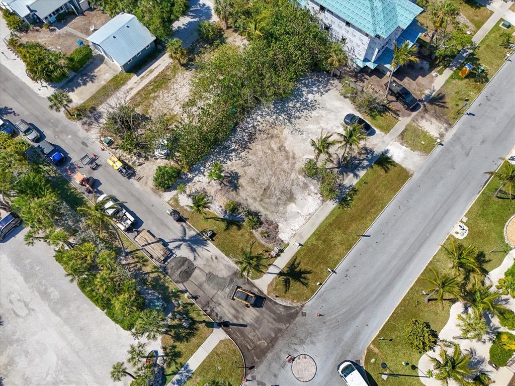 720 Broadway Street Longboat Key, FL 34228 - Photo 6 of 41 an aerial view of a house with a yard and a fountain