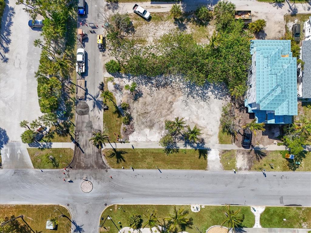 720 Broadway Street Longboat Key, FL 34228 - Photo 9 of 41 an aerial view of a house with a yard