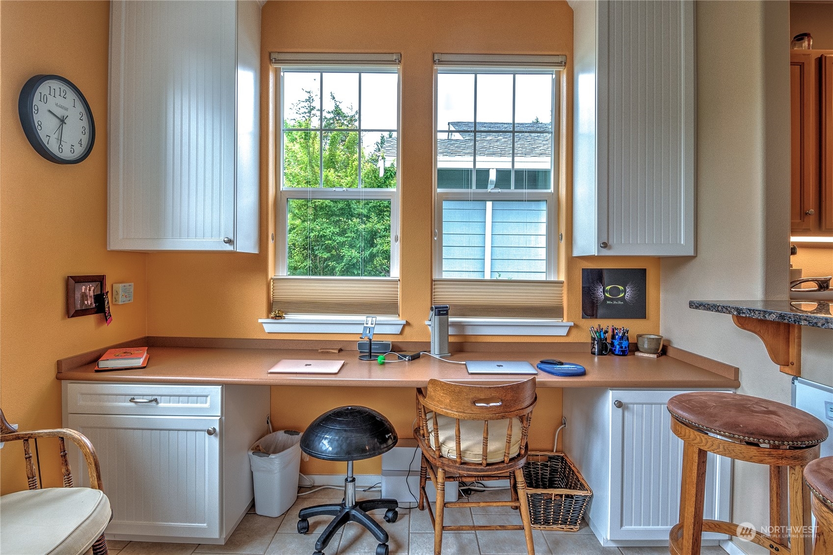 8024 Mercer Court Northeast Lacey, WA 98516 - Photo 11 of 30 a kitchen with a stove a table and chairs
