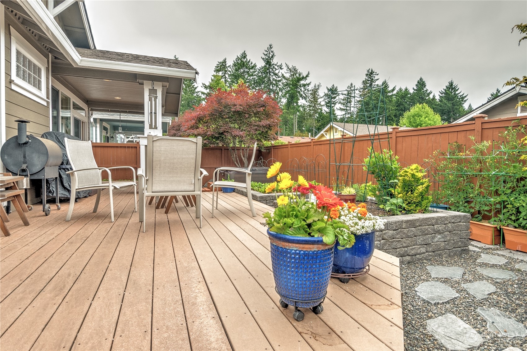 8024 Mercer Court Northeast Lacey, WA 98516 - Photo 23 of 30 a view of a tables and chairs on the roof deck