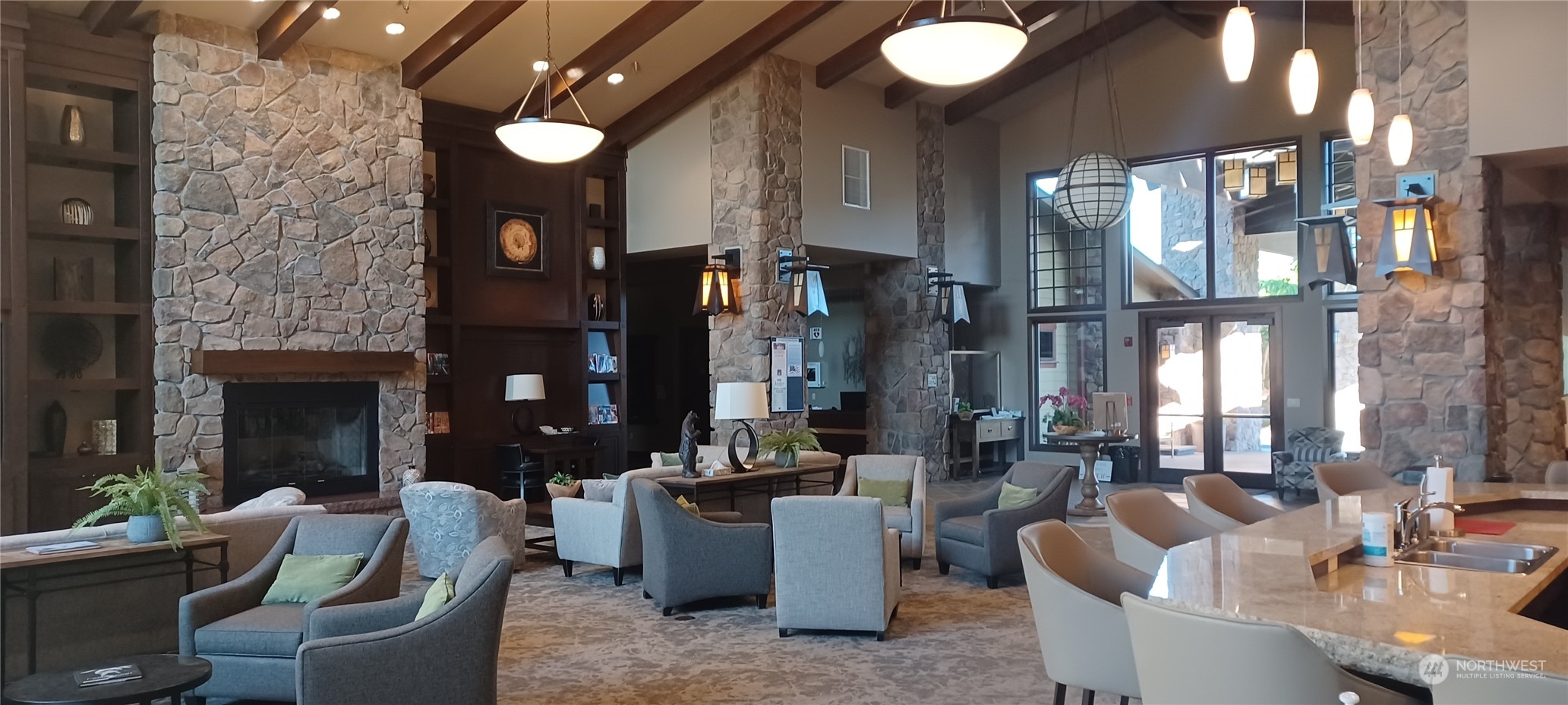8024 Mercer Court Northeast Lacey, WA 98516 - Photo 26 of 30 a living room with furniture and a fireplace
