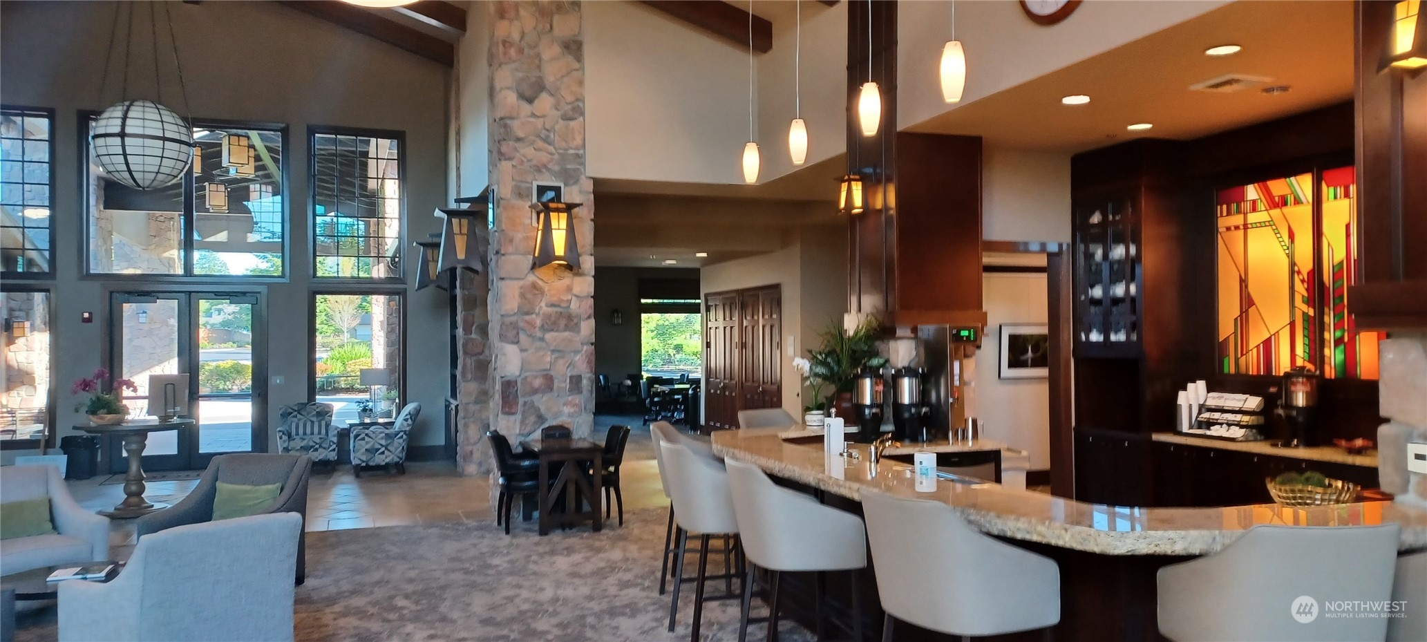 8024 Mercer Court Northeast Lacey, WA 98516 - Photo 27 of 30 a living room with furniture a window and kitchen view