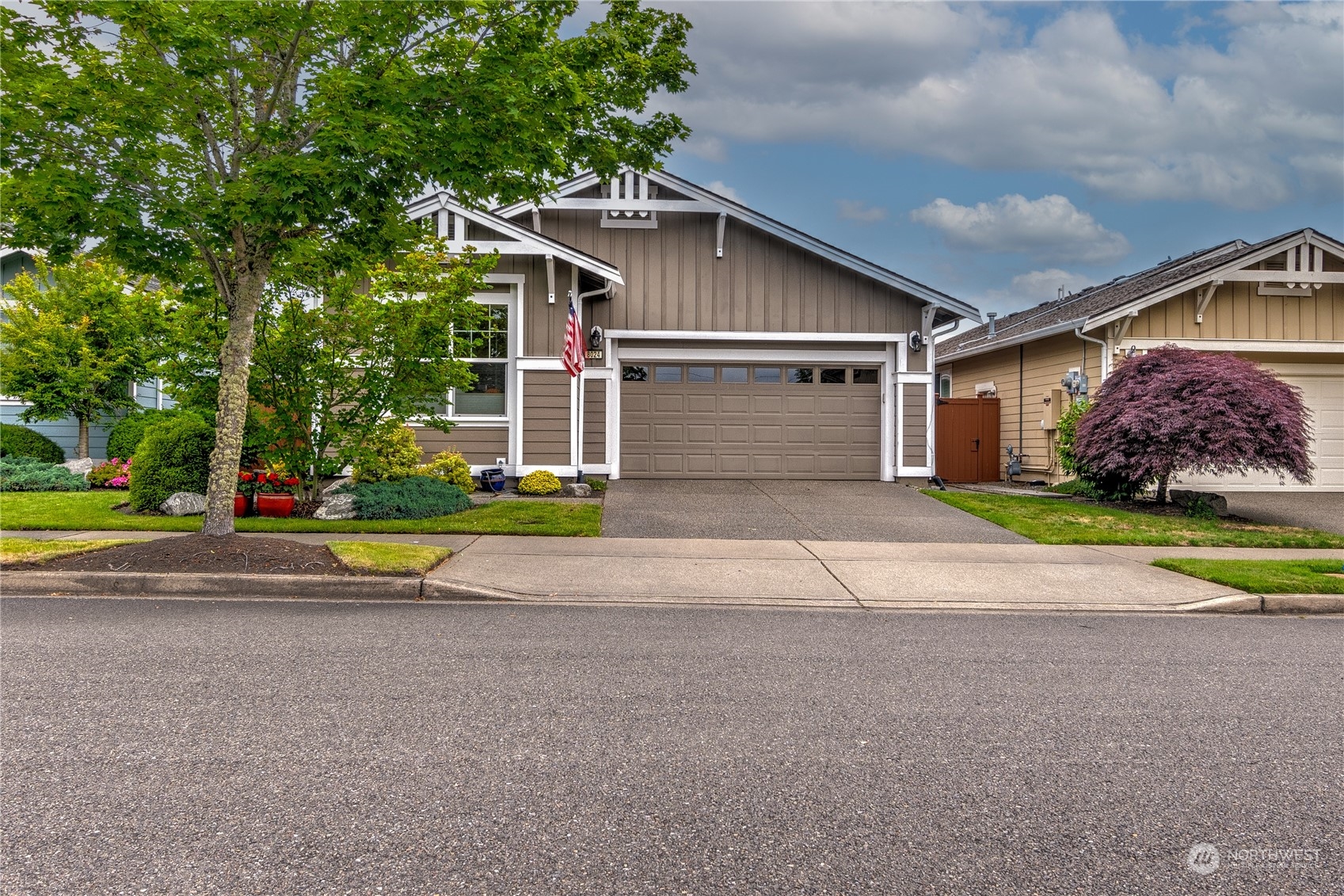 8024 Mercer Court Northeast Lacey, WA 98516 - Photo 30 of 30 a view of house with outdoor space and parking