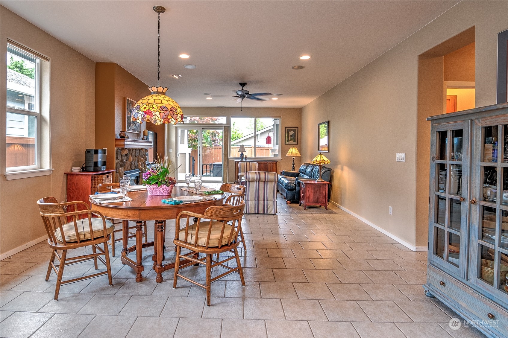 8024 Mercer Court Northeast Lacey, WA 98516 - Photo 4 of 30 a view of a dining room with furniture and floor to ceiling window