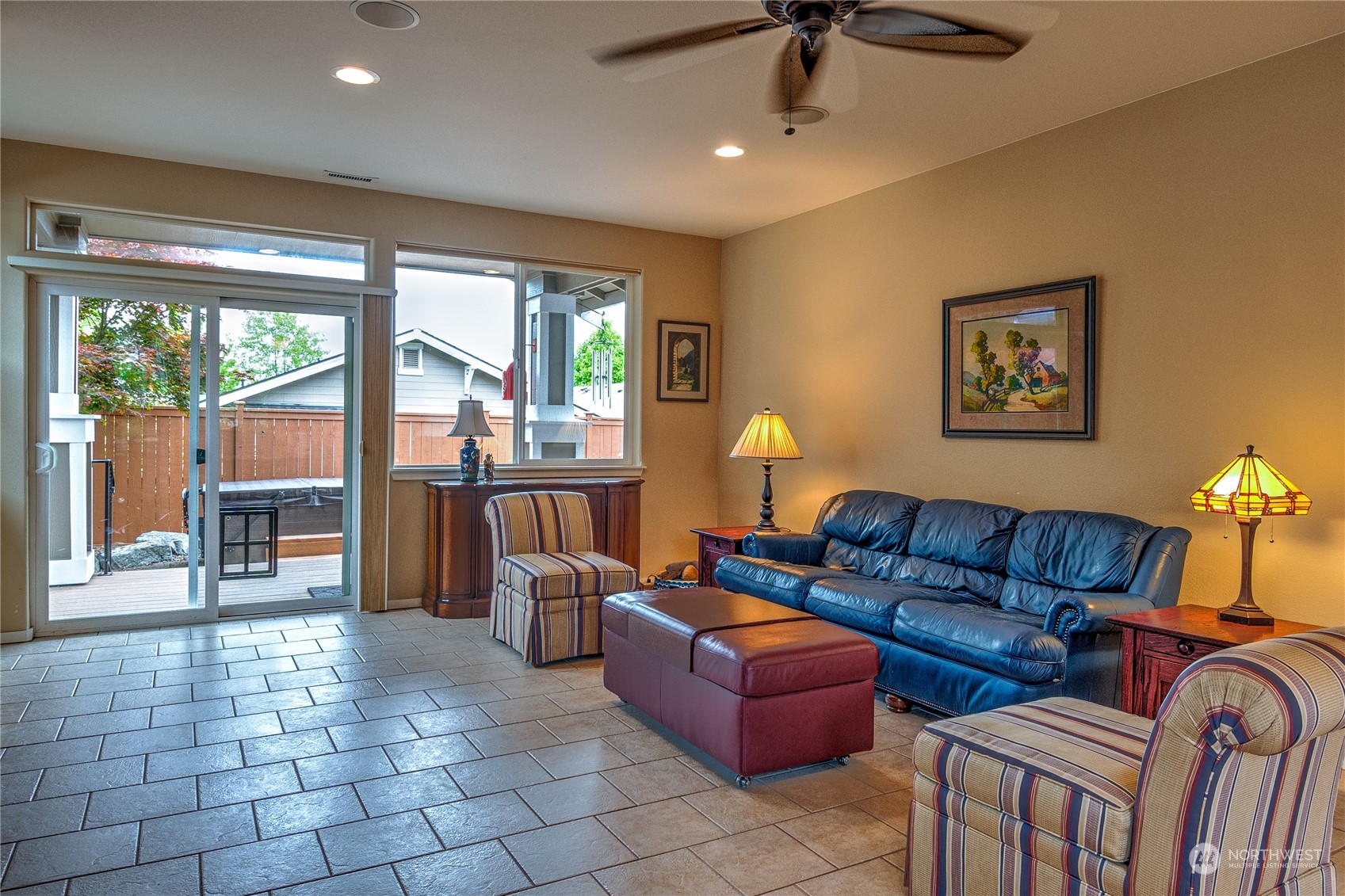 8024 Mercer Court Northeast Lacey, WA 98516 - Photo 5 of 30 a living room with furniture and a floor to ceiling window