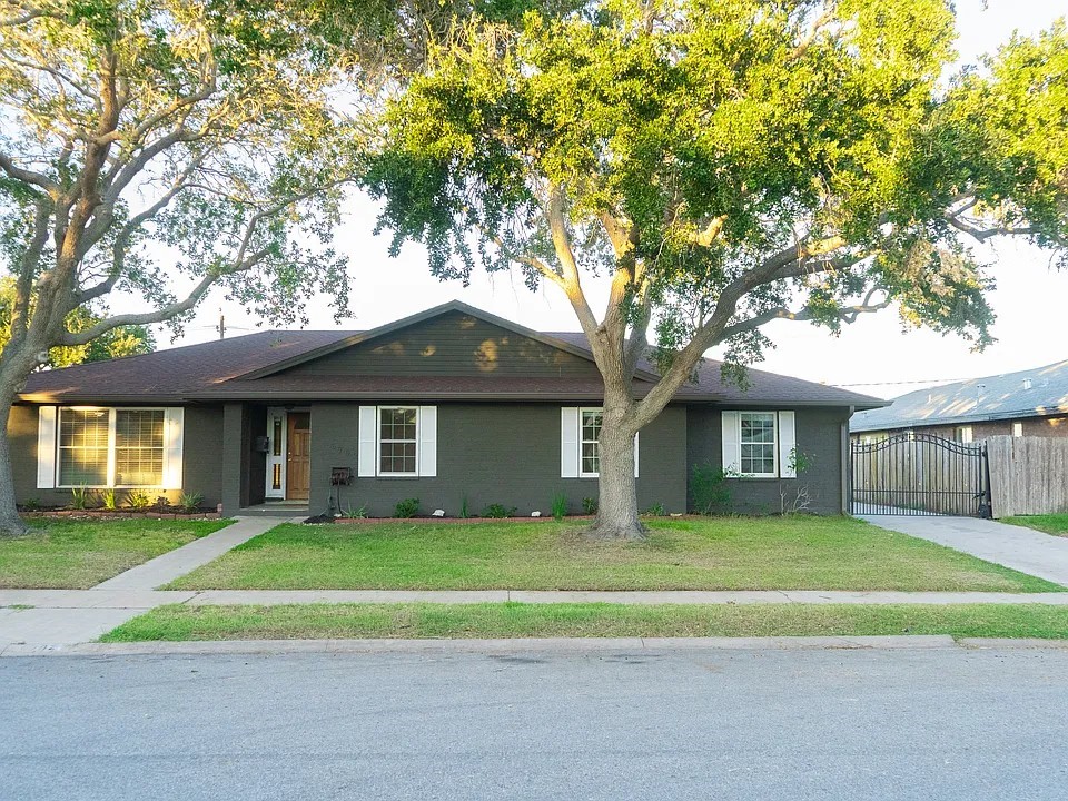6702 Sahara Drive Corpus Christi, TX 78412 - Photo 1 of 30 a white house that has a tree in front of it