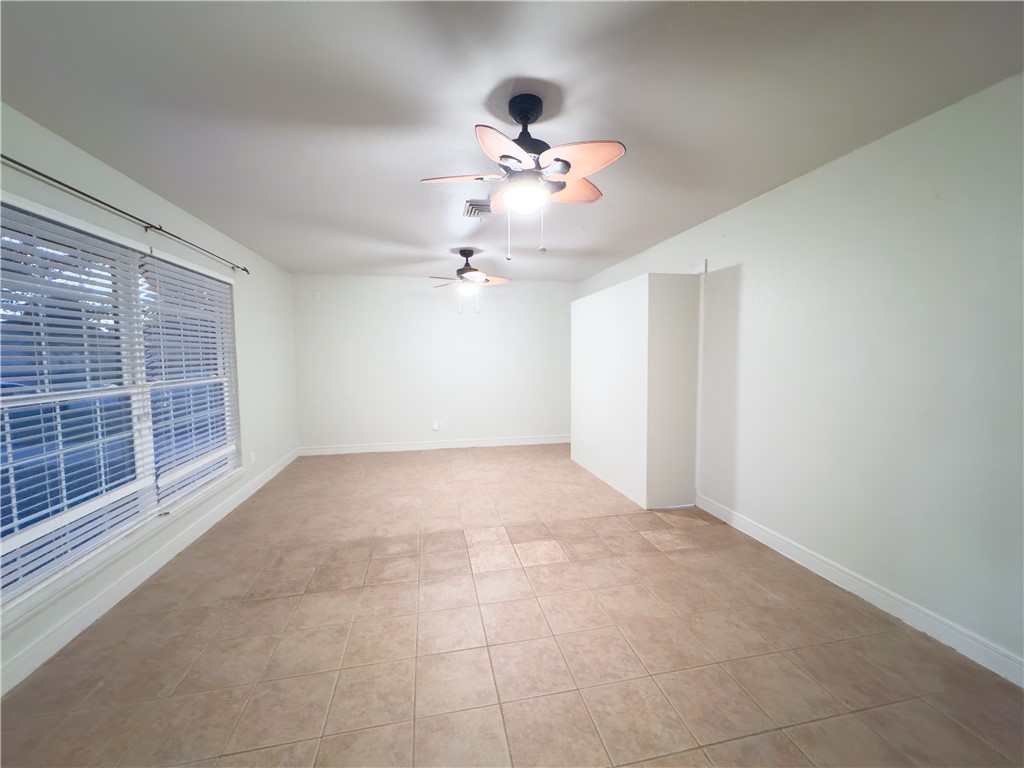 6702 Sahara Drive Corpus Christi, TX 78412 - Photo 26 of 30 a view of an empty room with a window