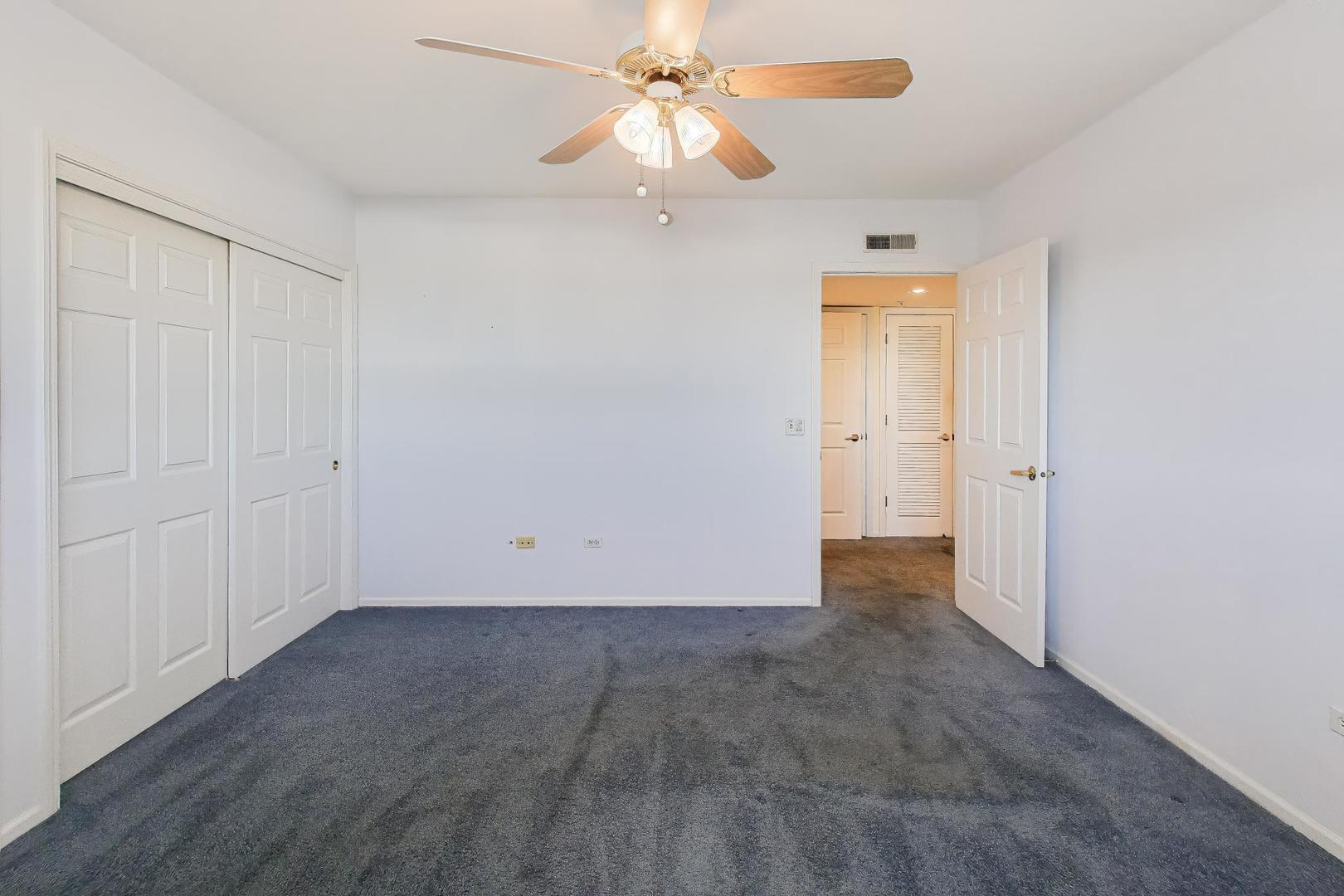 650 South River Road, Unit 812 Des Plaines, IL 60016 - Photo 19 of 25 wooden floor in an empty room
