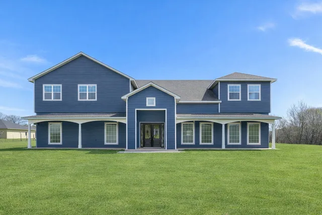 a house view with a garden space