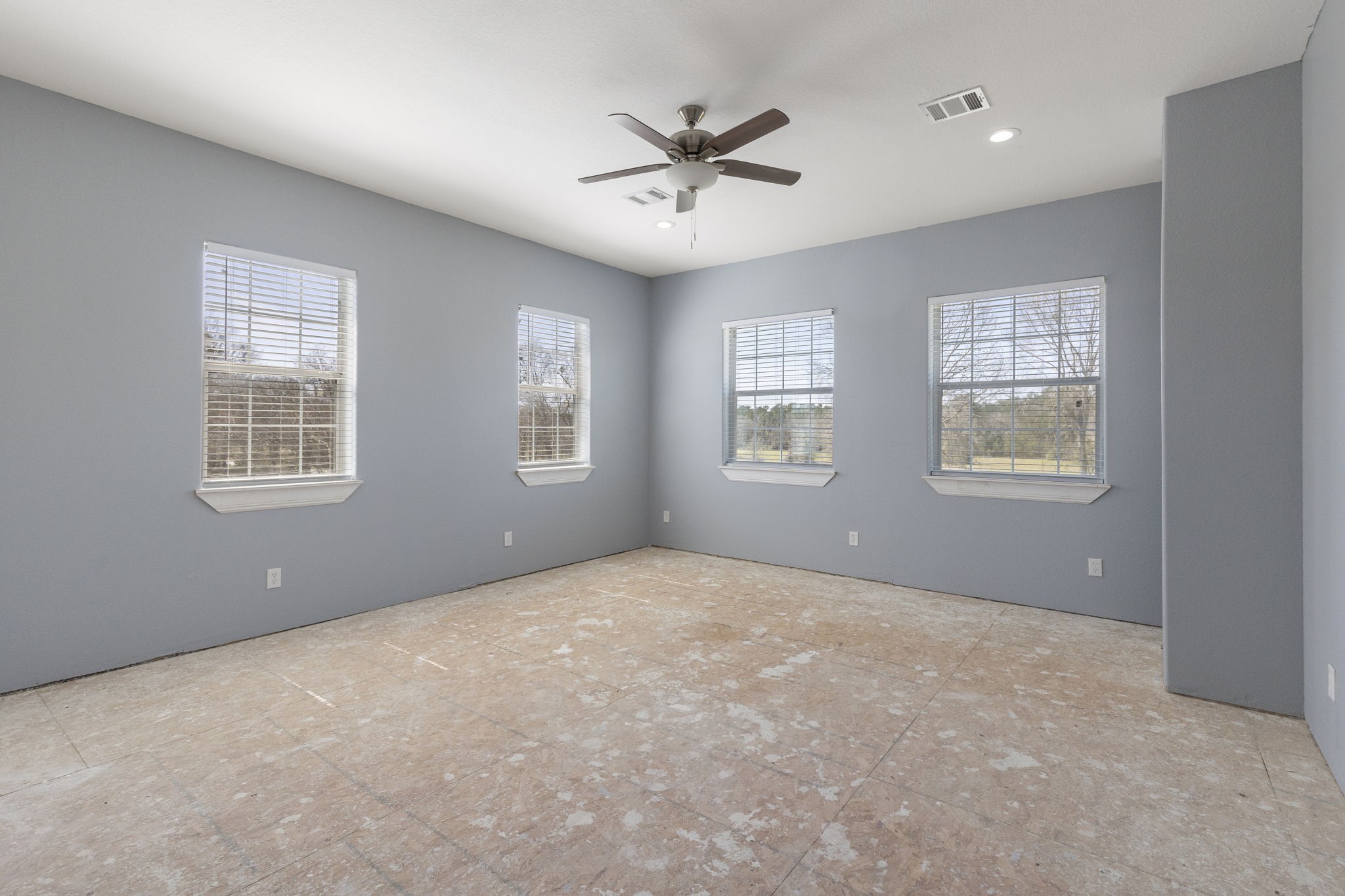2464 North Walker Road Cleveland, TX 77328 - Photo 18 of 42 a view of an empty room with a window
