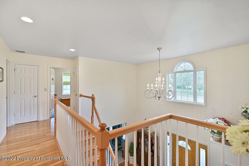 47 Wildernest Road Moscow, PA 18444 - Photo 23 of 40 a view of an entryway wooden floor and windows