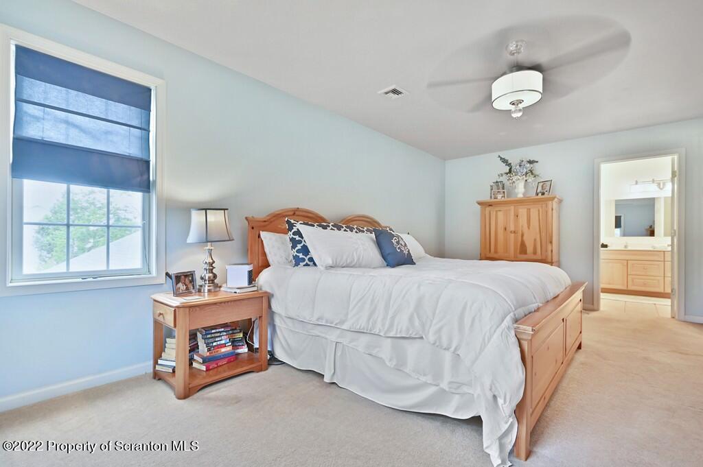 47 Wildernest Road Moscow, PA 18444 - Photo 34 of 40 a bedroom with a bed and a window