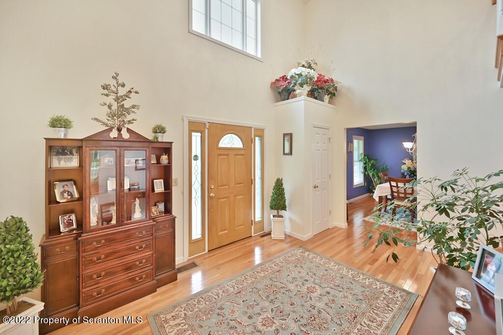 47 Wildernest Road Moscow, PA 18444 - Photo 6 of 40 a living room with furniture and wooden floor