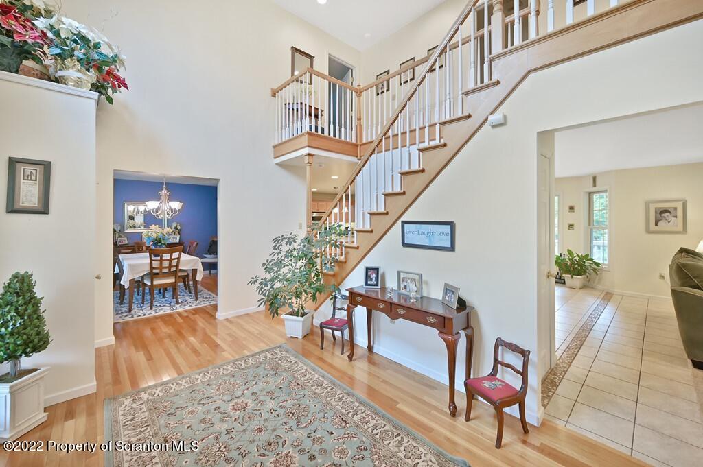47 Wildernest Road Moscow, PA 18444 - Photo 7 of 40 a living room with furniture and a rug